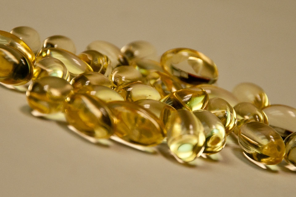 Cápsulas doradas de vitamina E